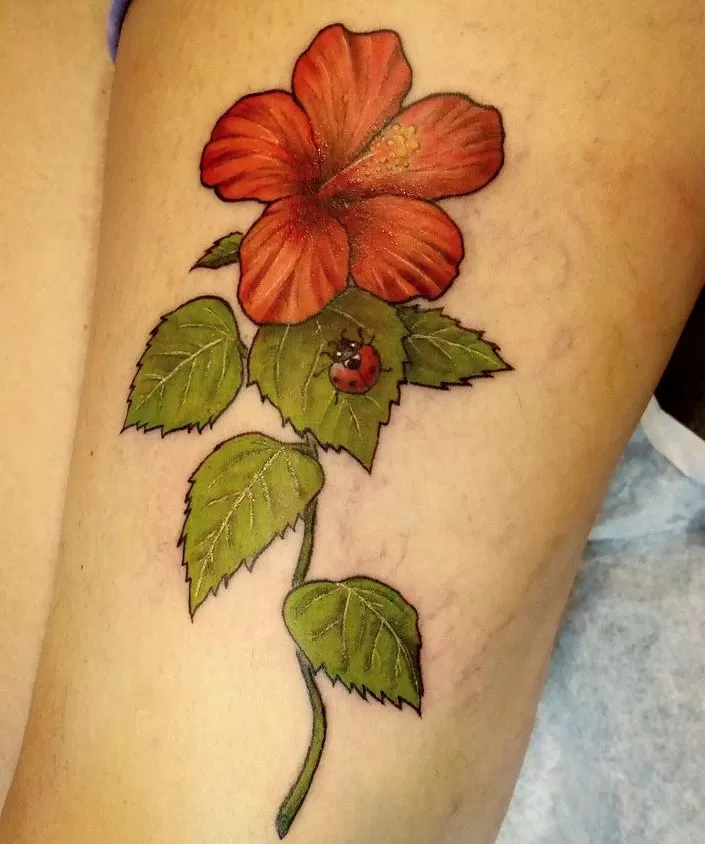 Hibiscus tattoo done by Brian Haggerty at Overlord Tattoo Studio, Palm Coast, Flagler Beach FL. 