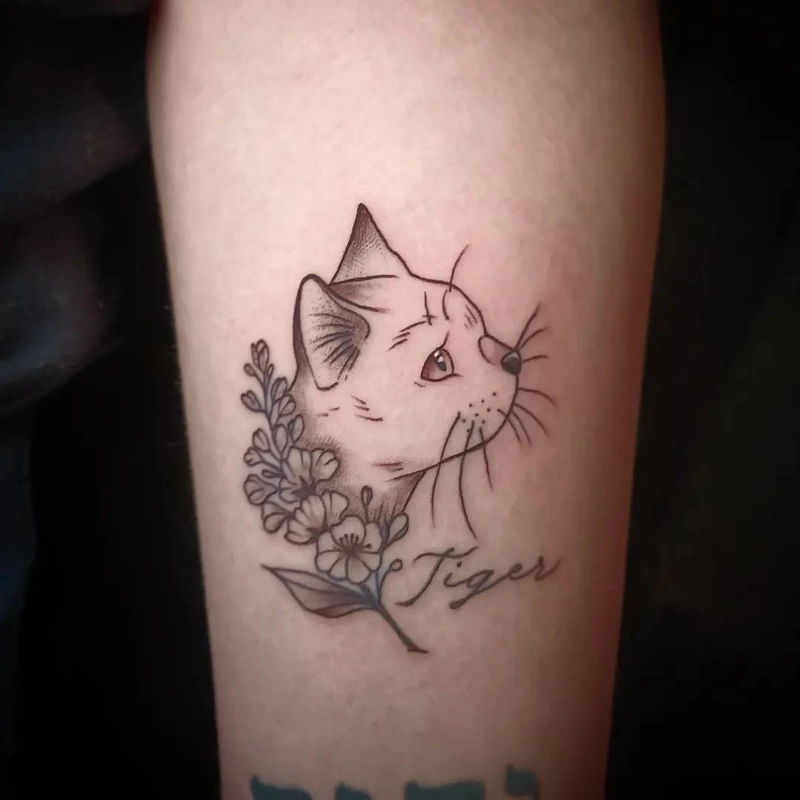 Floral cat tattoo done by Brian Haggerty at Overlord Tattoo Studio, Palm Coast, Flagler Beach FL. 