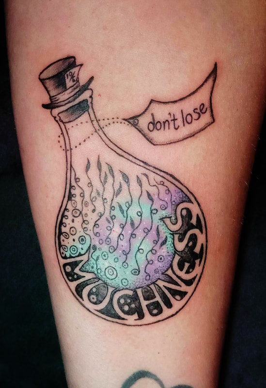 Potion bottle tattoo done by Brian Haggerty at Overlord Tattoo Studio, Palm Coast, Flagler Beach FL. 
