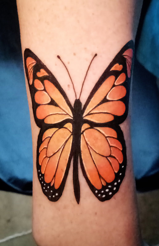 Butterfly tattoo done by Brian Haggerty at Overlord Tattoo Studio, Palm Coast, Flagler Beach FL. 