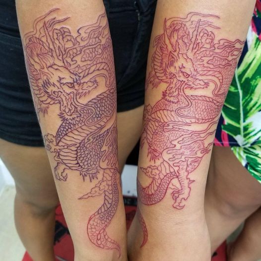 Dragon tattoo,match tattoo,red tattoo,Overlord tattoo shop Palm Coast FL