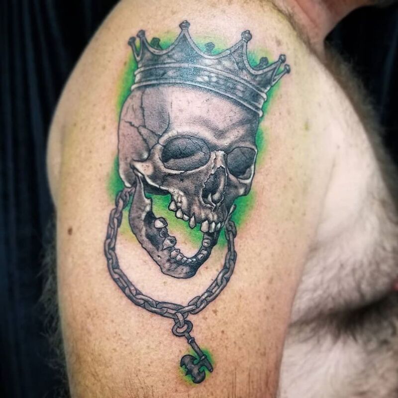 King skull tattoo done at Overlord Tattoo Shop in Palm Coast FL