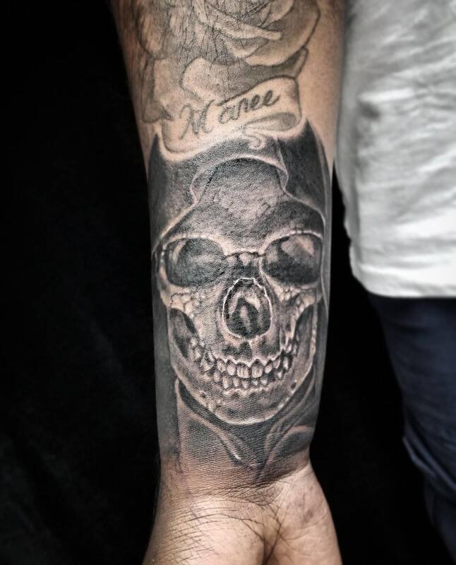 Skull,tattoo,black and grey,Overlord tattoo shop Palm Coast FL