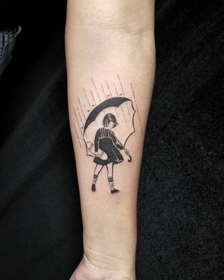 Umbrella girl tattoo done at Overlord Tattoo Shop in Miami Beach